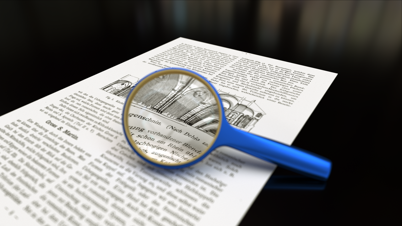 Magnifying glass with focus on paper. Text in the background is from the public domain work Die Baukunst, issue 11, page 8, written by Max Hasak. Rend