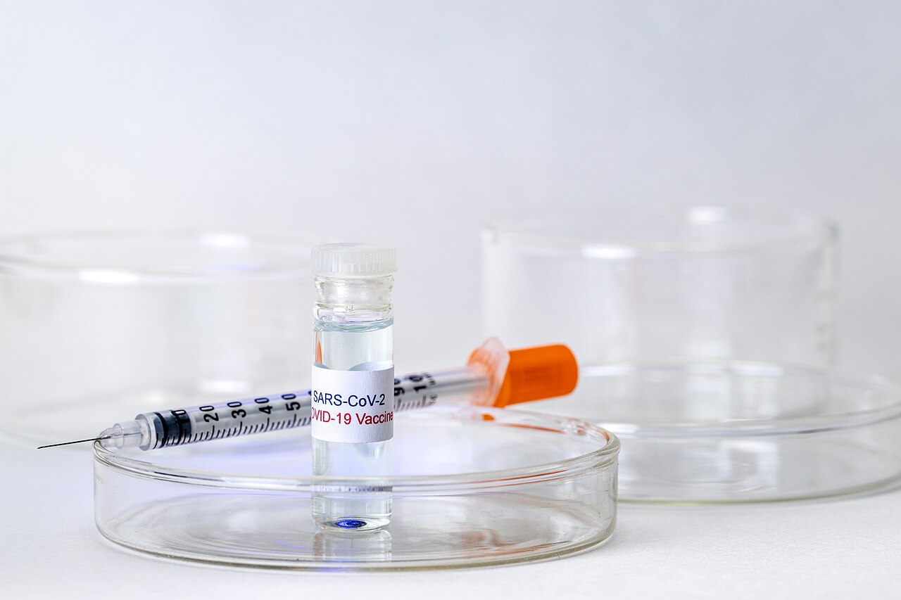 Covid-10 Vaccine and Syringe