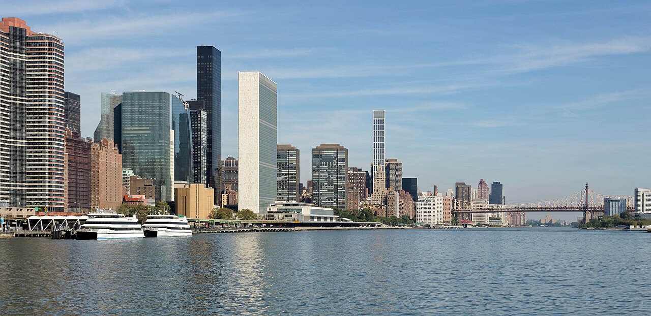 Shore of the East River with Headquarters of the United Nations (on the left), New York City