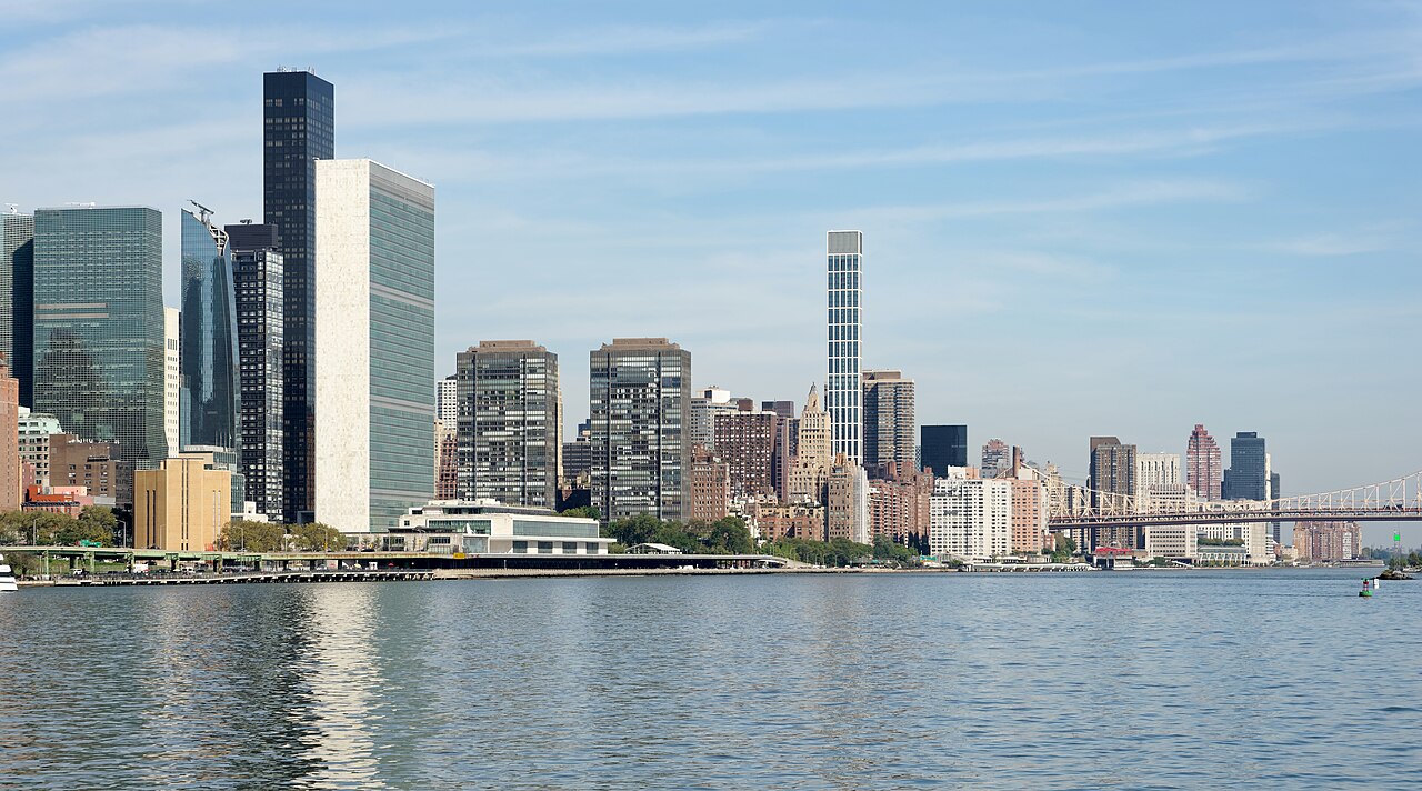 Shore of the East River with Headquarters of the United Nations (on the left), New York City